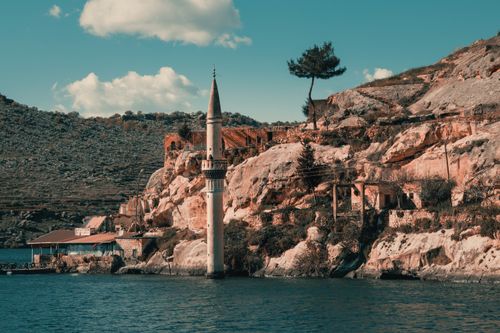 Free Explore Halfeti Village's unique landscape with its submerged minaret peeking from the Euphrates River. Stock Photo