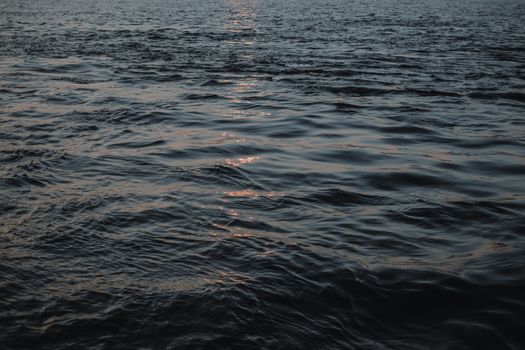 A Faint Reflection of the Sunlight in the Sea