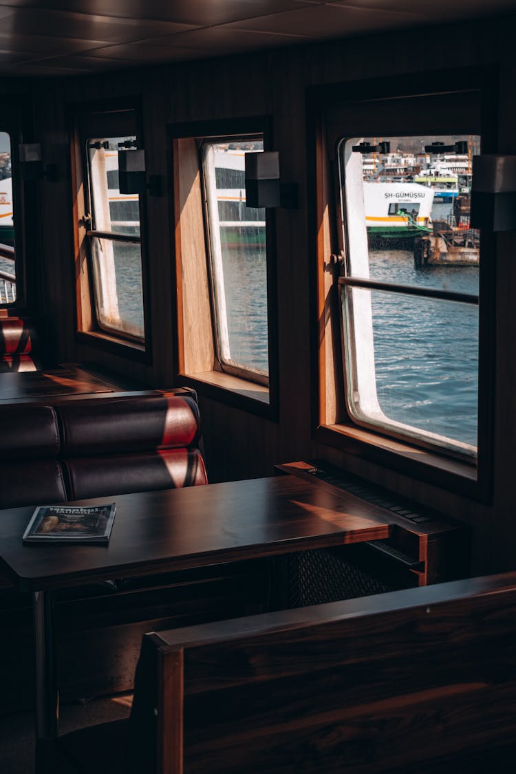 Chairs And Table Inside A Boat