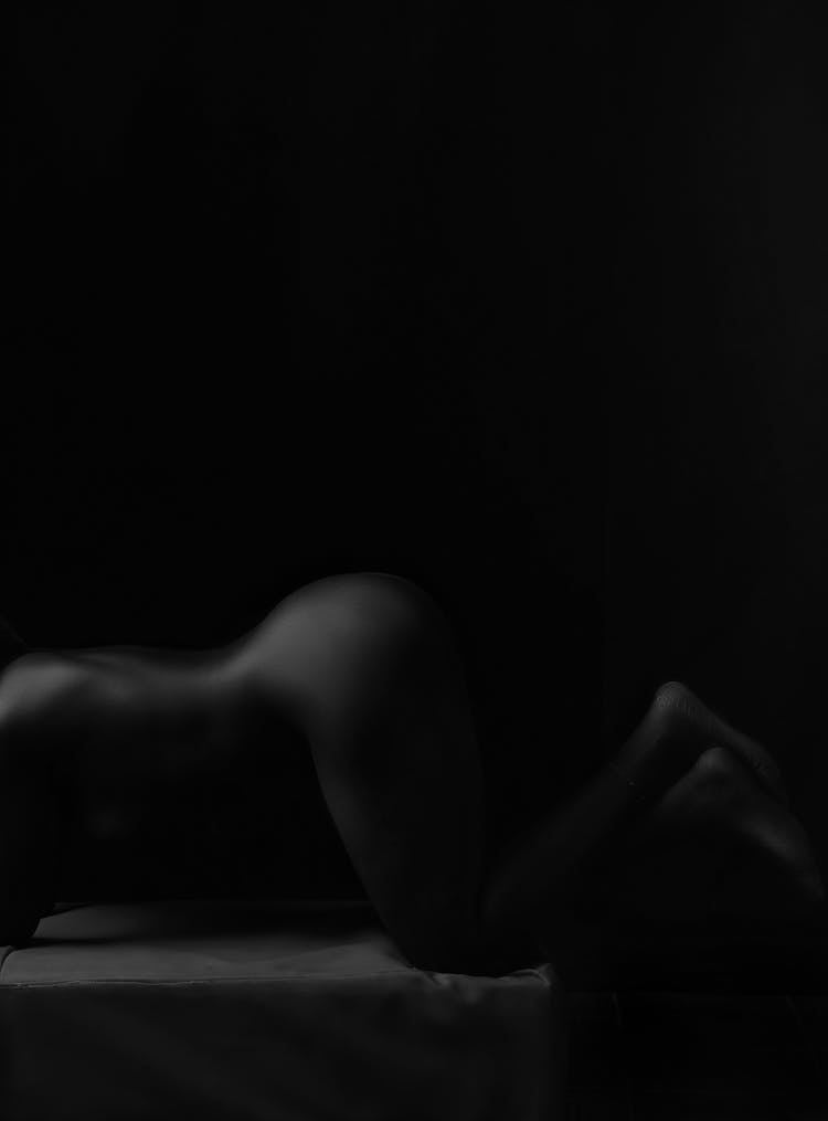 Naked Woman In Dark Room