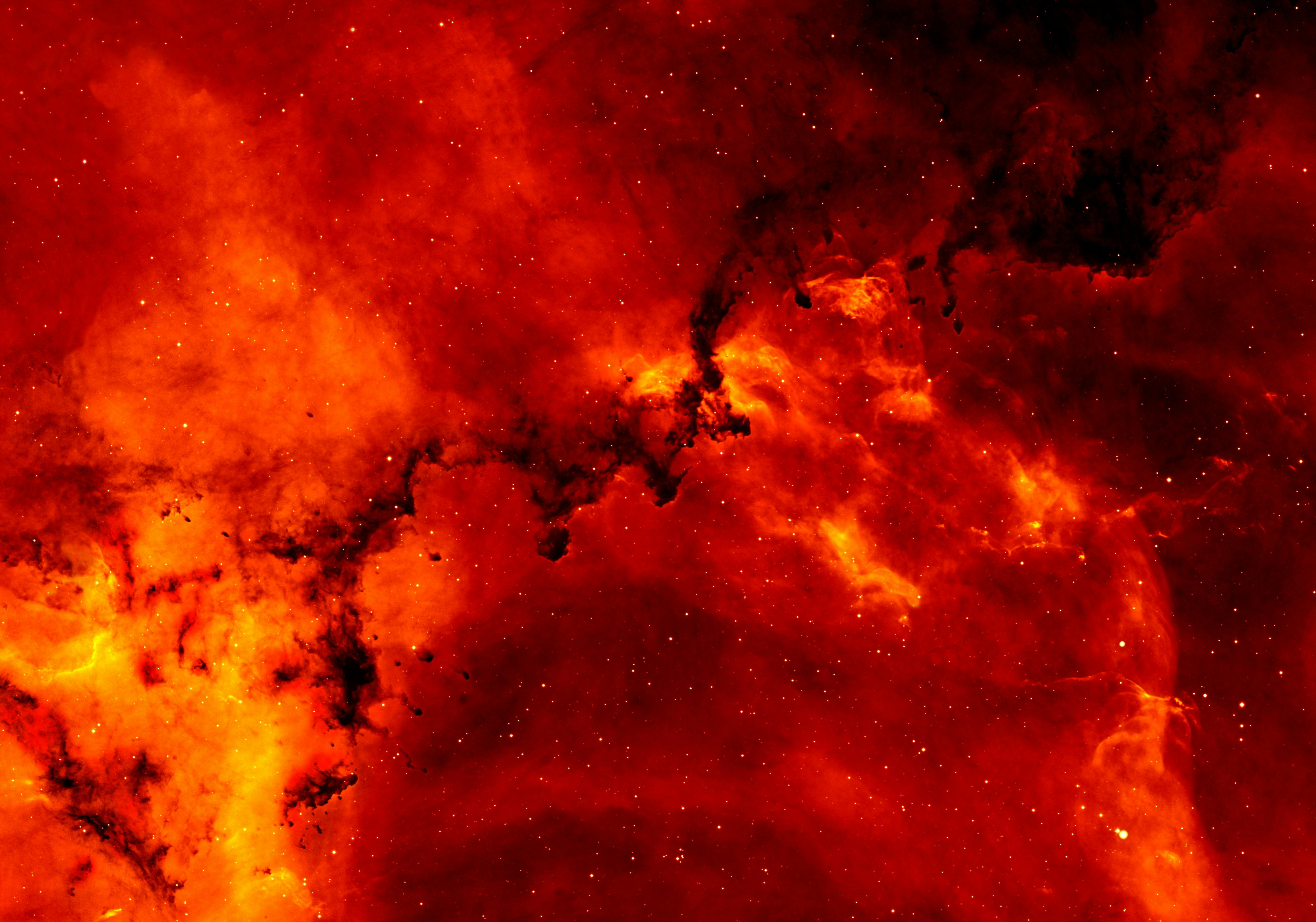 A rectangular image of a Red and Orange Solar Flare.