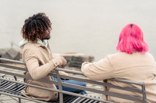 Man and Woman Sitting on the Bench