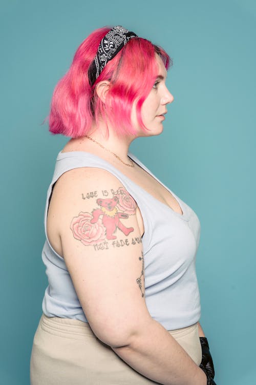 Plus size woman with pink hair