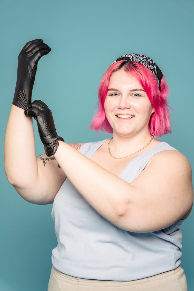 Plus Size Woman Putting On Gloves