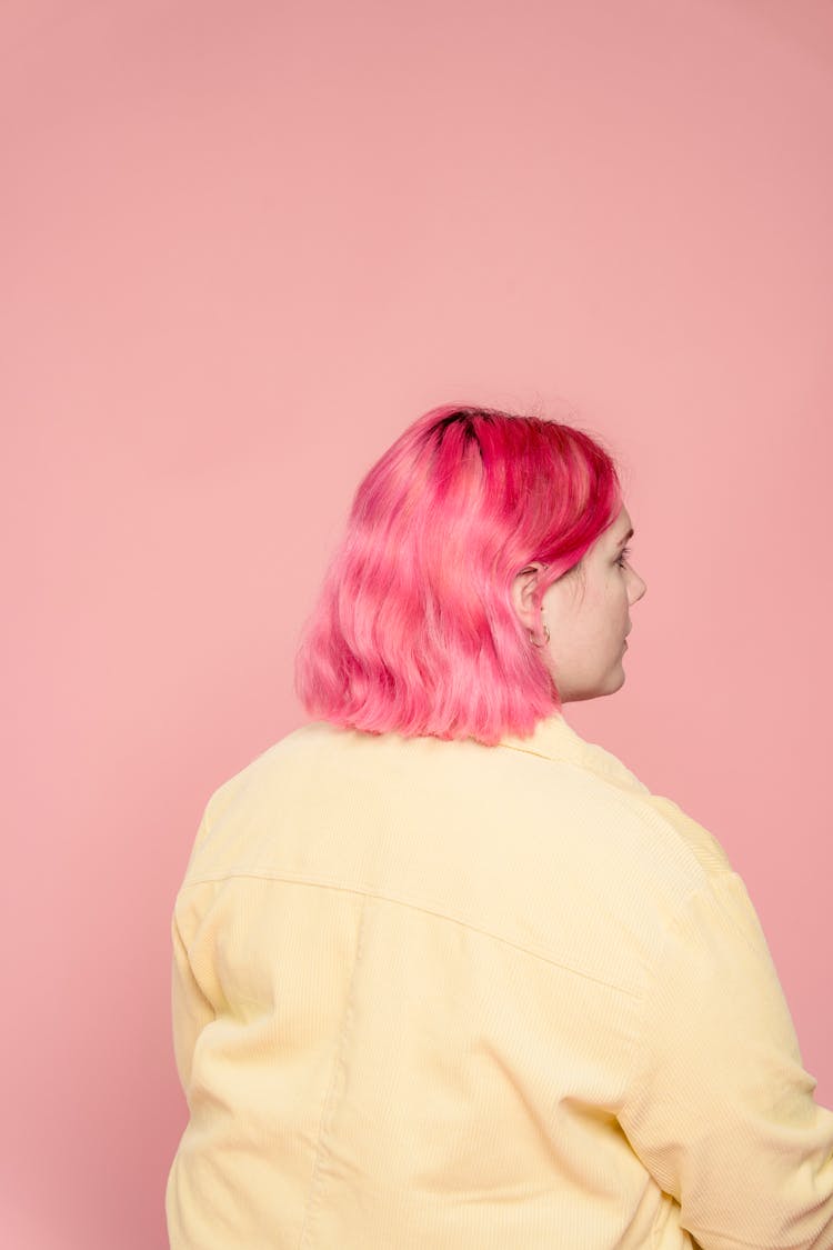 Young Overweight Woman In Jacket In Studio