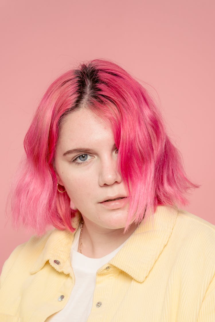 Stylish Woman With Dyed Bright Hair In Studio