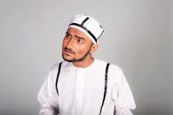 A Man in White and Black Long Sleeve Shirt