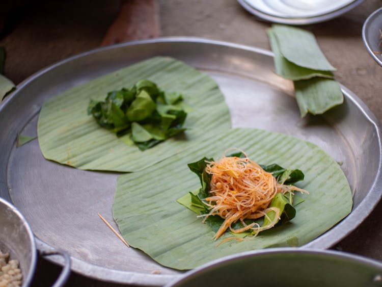 A Spicy Shredded Radish Salad On Banana Leaf