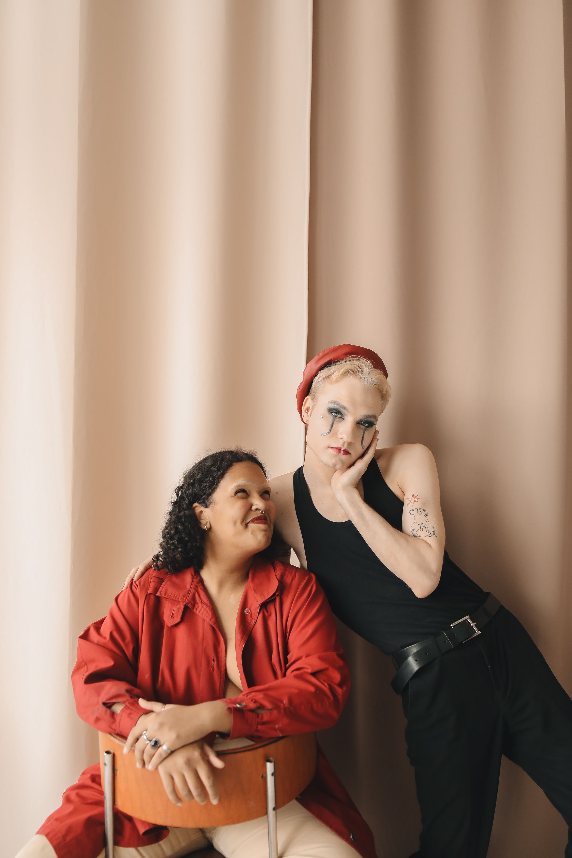 Two people together in an expressive editorial portrait