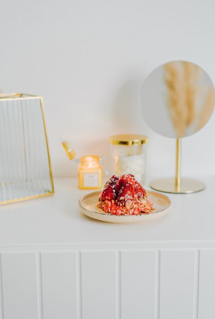 Indulge in this delectable dessert displayed elegantly on a minimalistic white table setting.