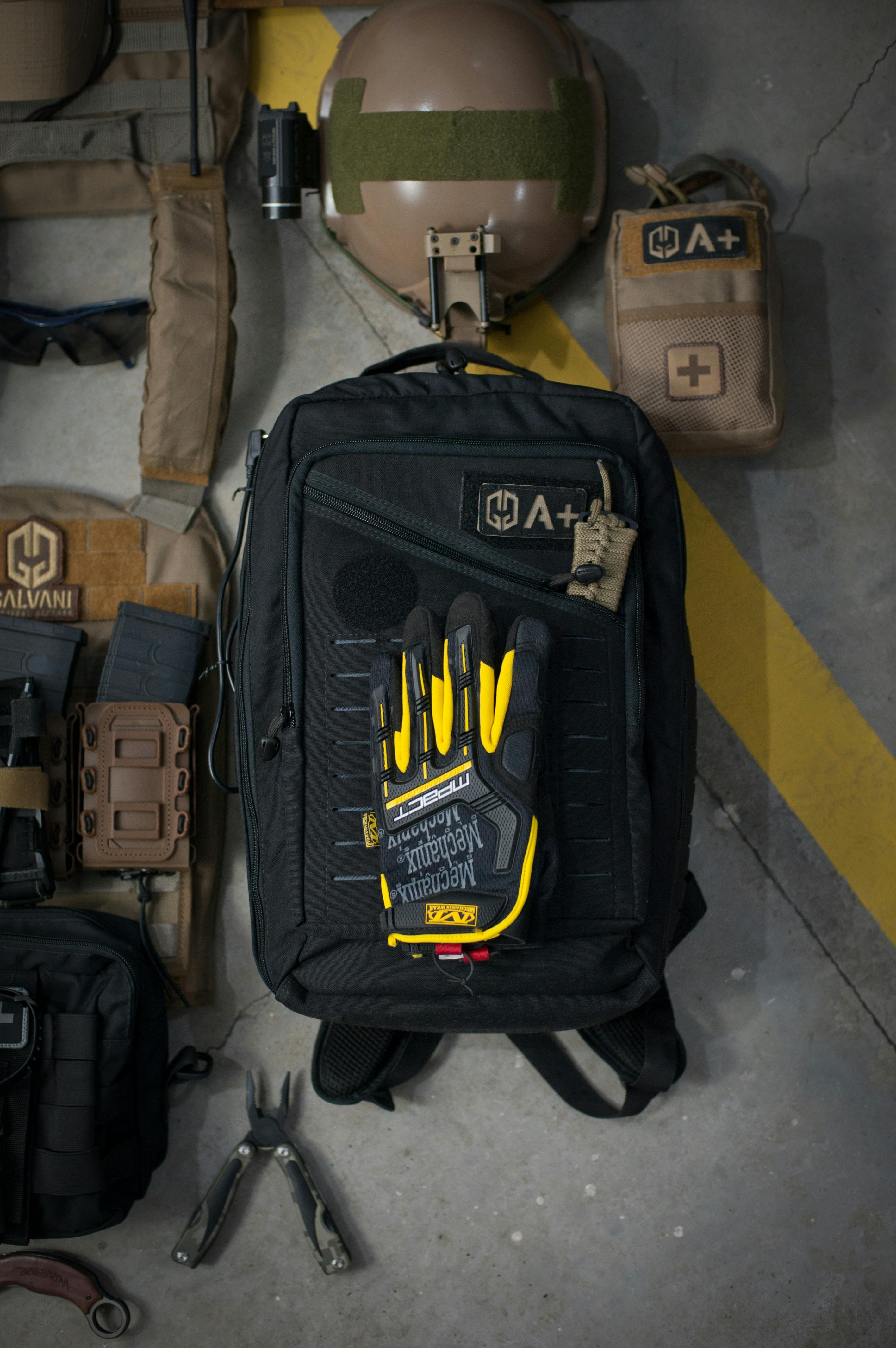 Magazines and Plant Garland Hanging on Wall with Patterned Wallpaper ...