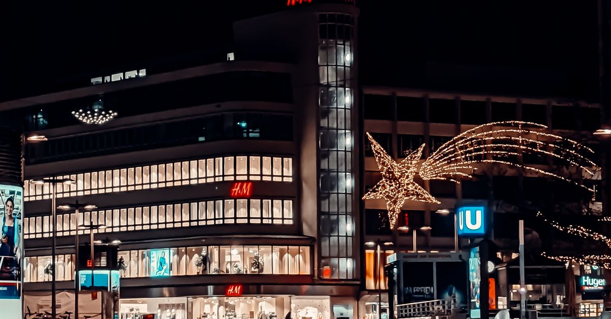 Cloth Store Building Clothing Store Building at Night · Free Stock Photo