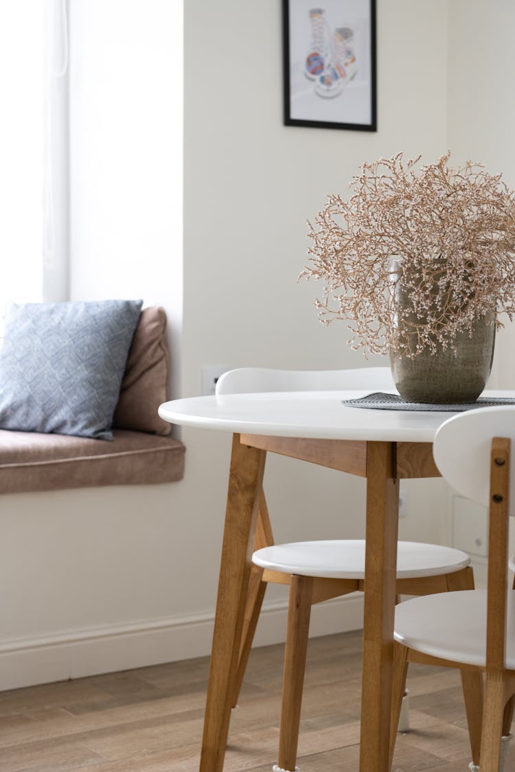 Table With Dried Plants In Living Room