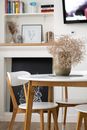Cozy apartment with dining area and bookshelf