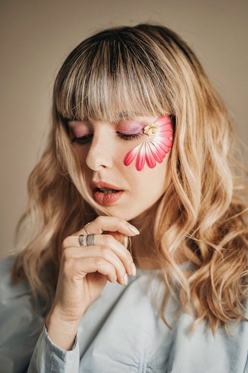 Portrait of a Woman with a Flower on Her Face