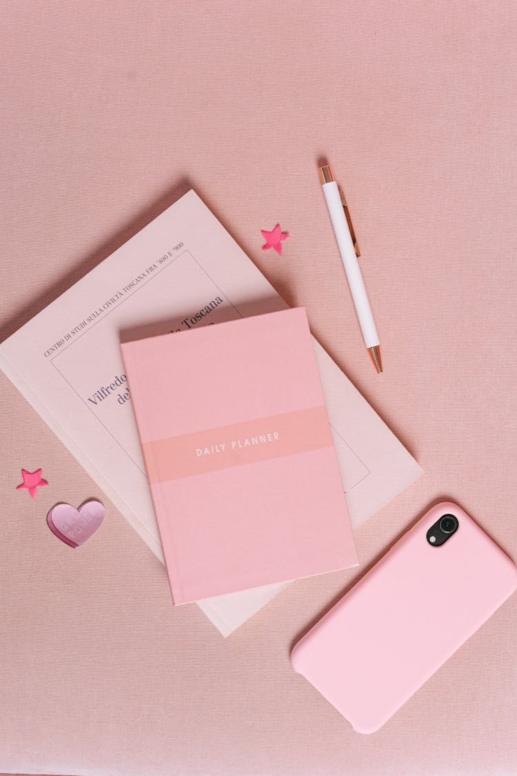 Pink Planner And Smartphone