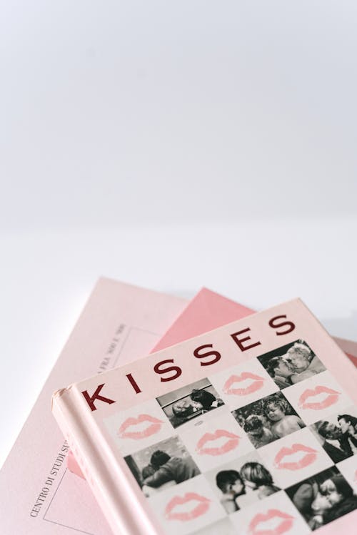 Free Pink and White Cards on White Surface Stock Photo