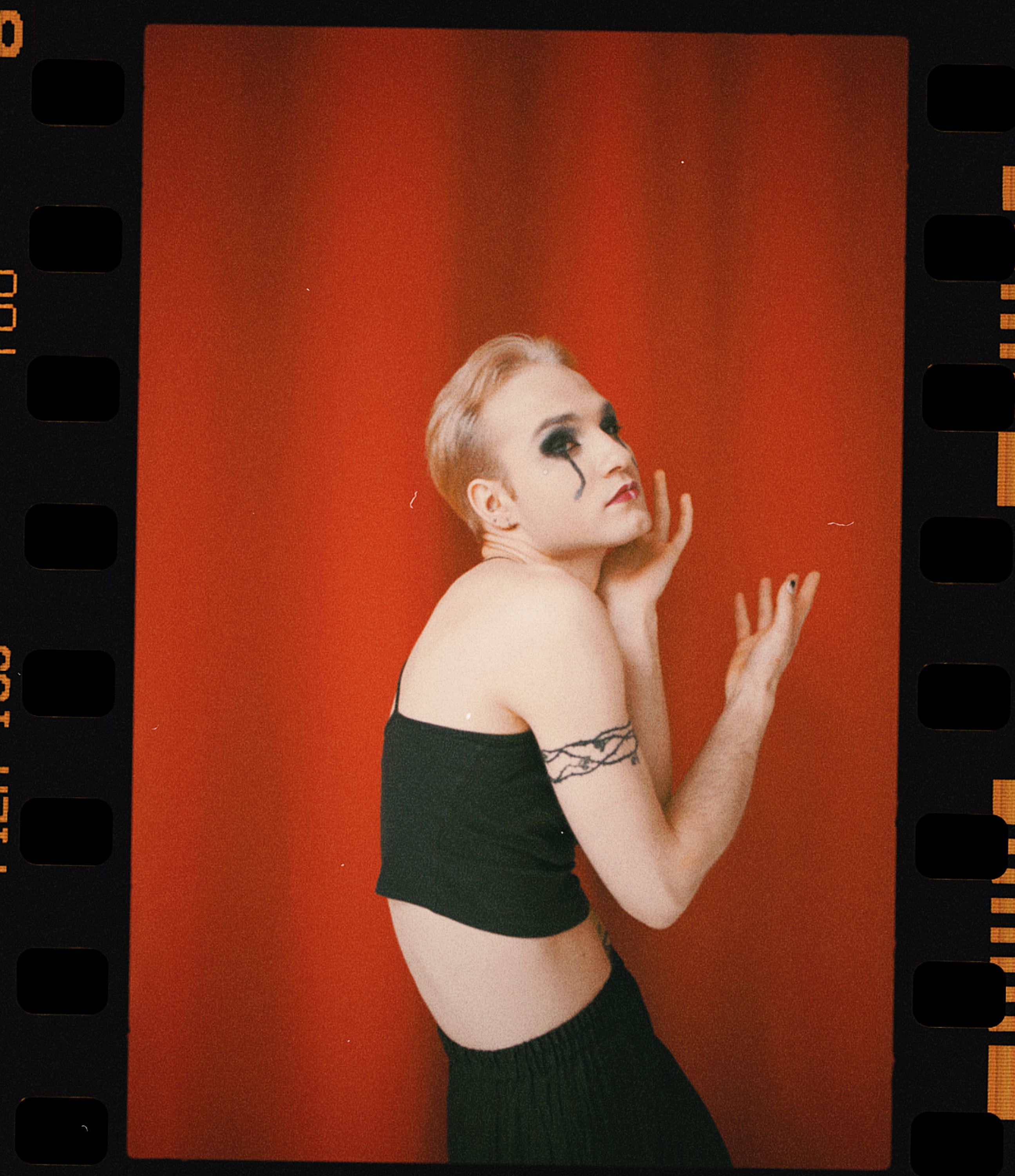 An expressive fashion portrait focused on identity and presentation