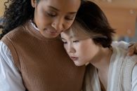 Woman in Brown and White Striped Turtleneck Sweater