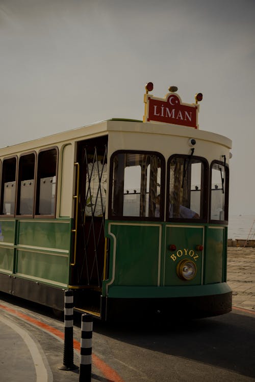 Green Tram Parked on the Street