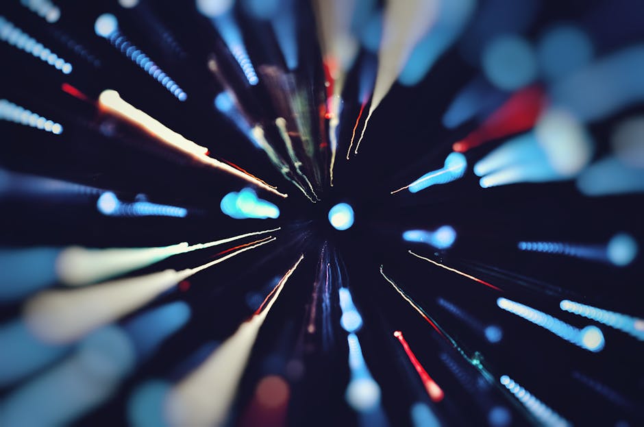 Vibrant abstract light trails captured with long exposure, creating a colorful dynamic effect.