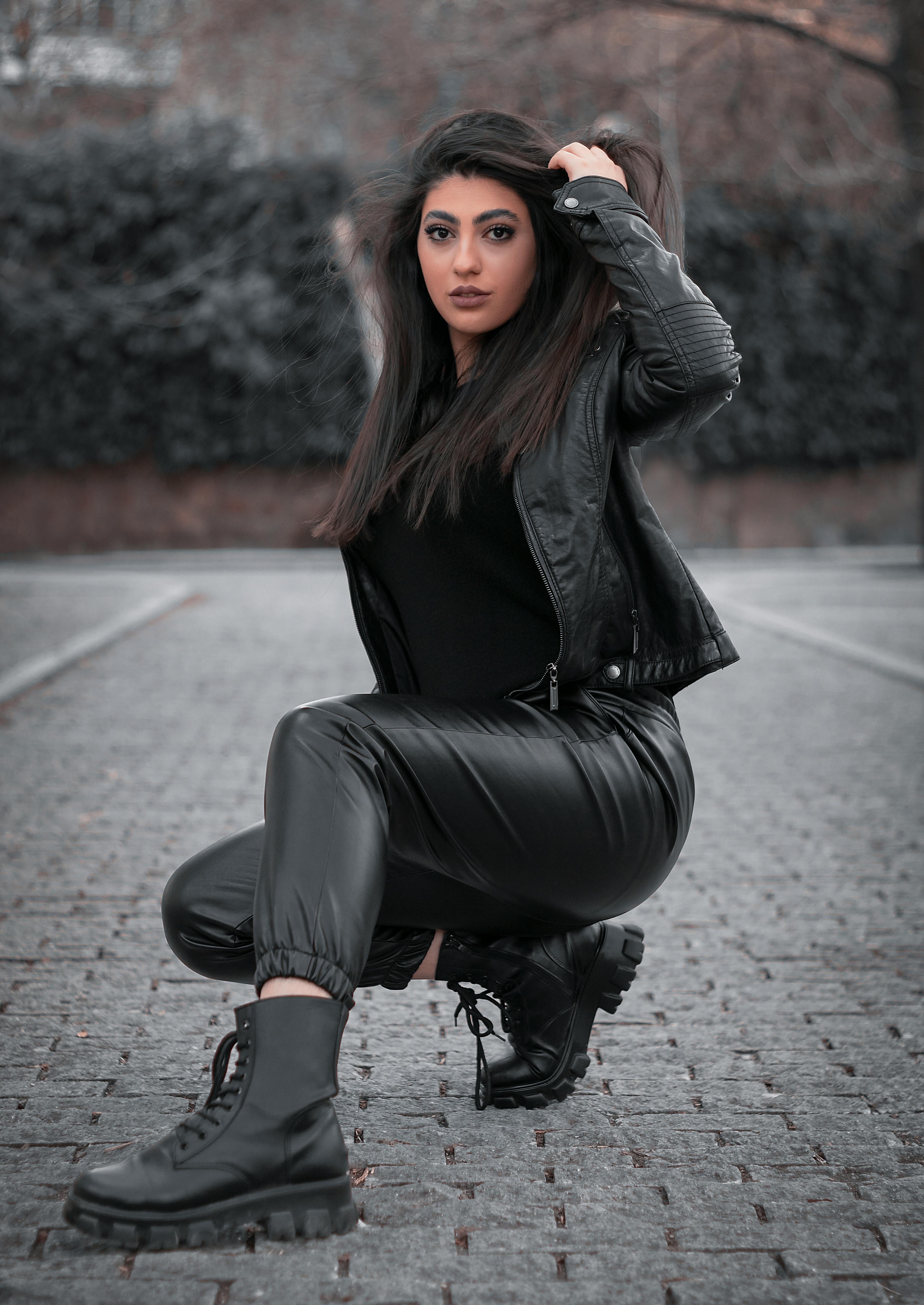 A Woman Wearing Brown Leather Pants · Free Stock Photo