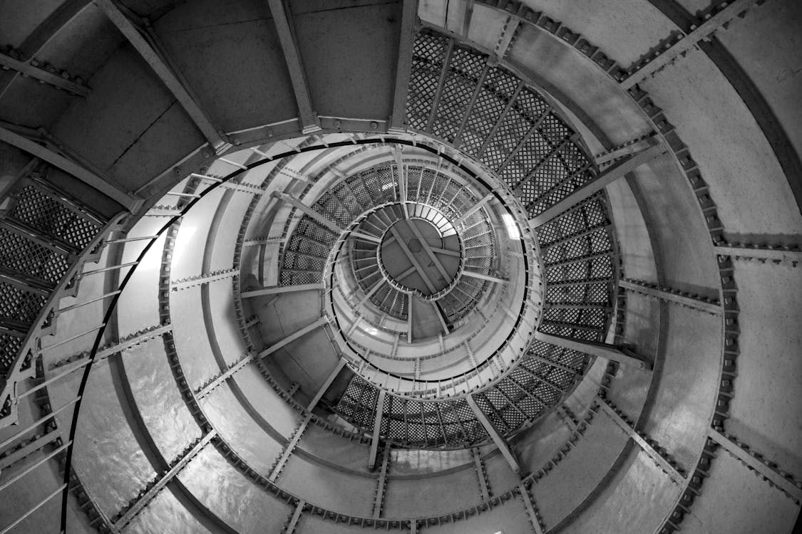 Free Spiral staircase with metal railing inside beacon Stock Photo