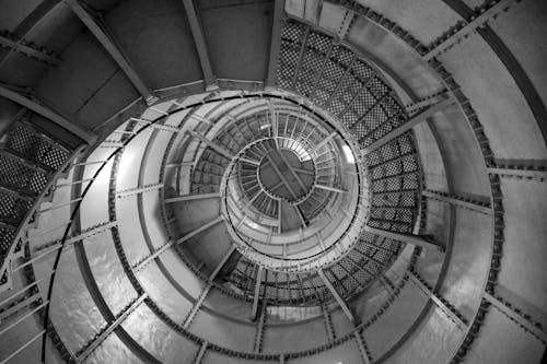 Spiral staircase with metal railing inside beacon