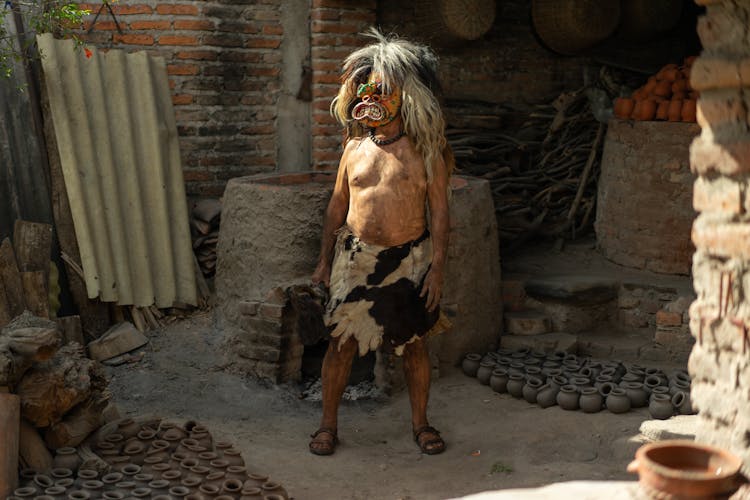 Shirtless Man Wearing A Scary Mask