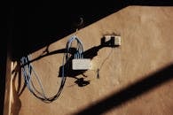 Network adapter with wires on wall