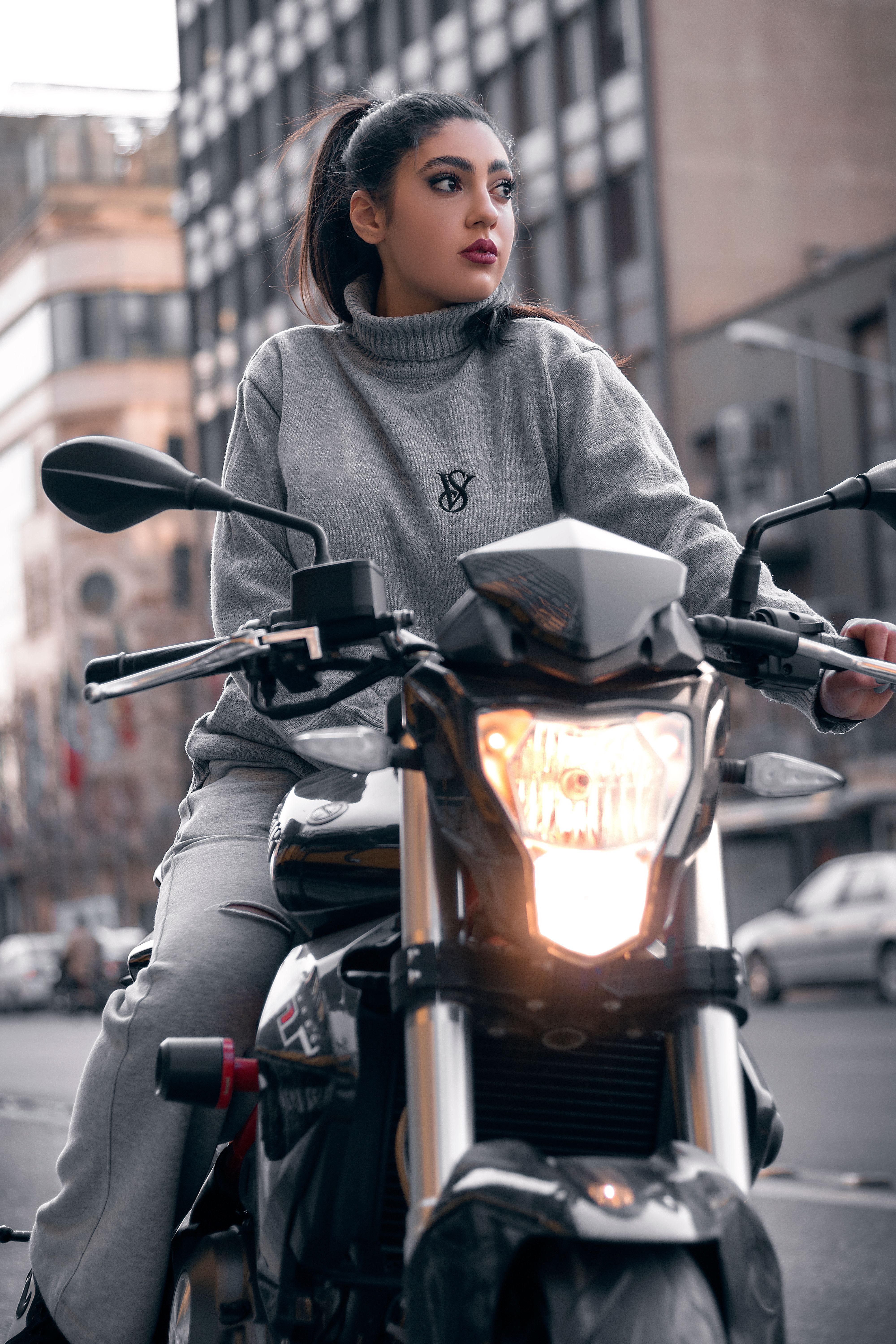 A Woman Riding a Motorcycle · Free Stock Photo