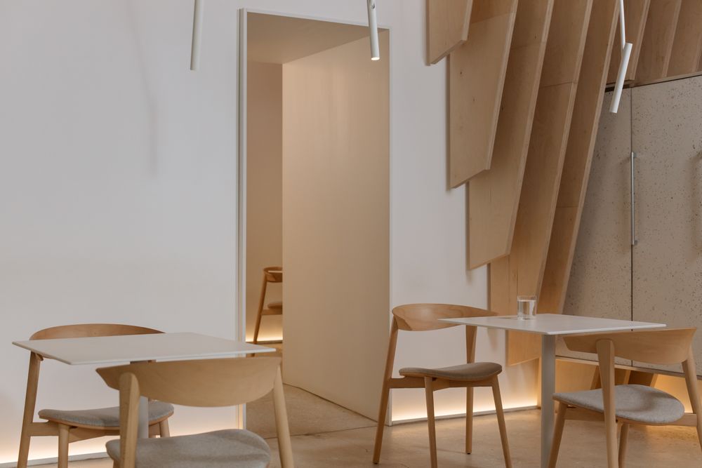 Draft announcement card: a light wood meeting space — photo by cottonbro studio on Pexels