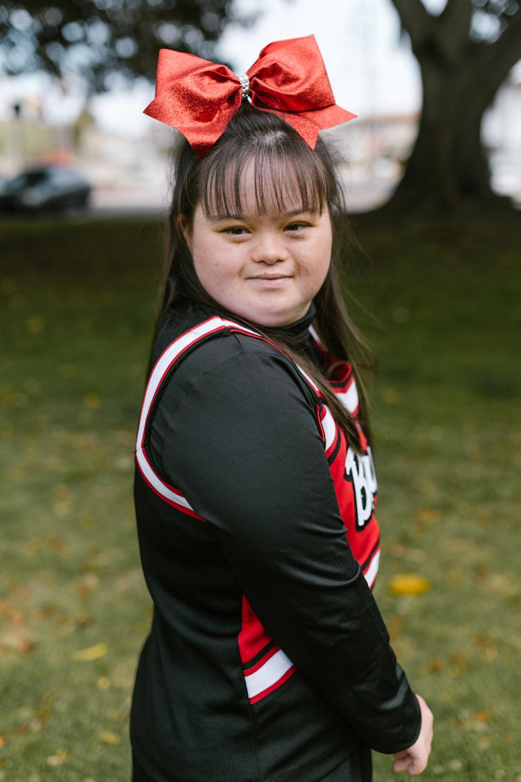 A Woman In Cheerleader Outfit