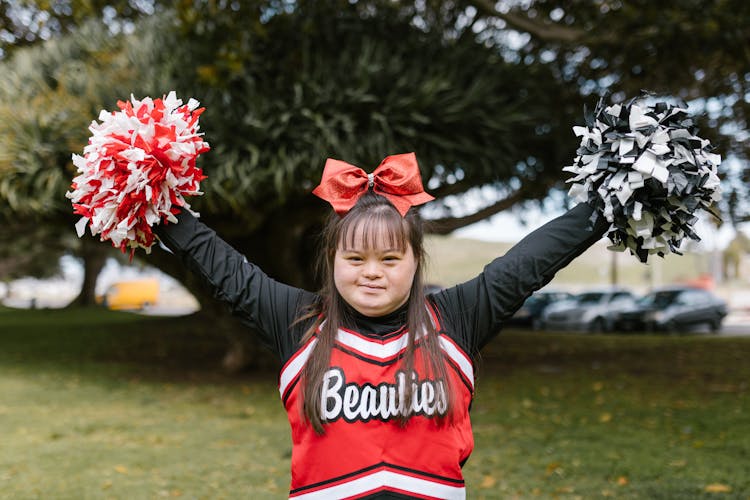 A Woman In Cheerleader Outfit