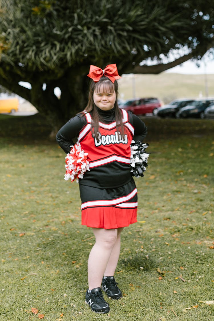 A Woman In Cheerleader Outfit