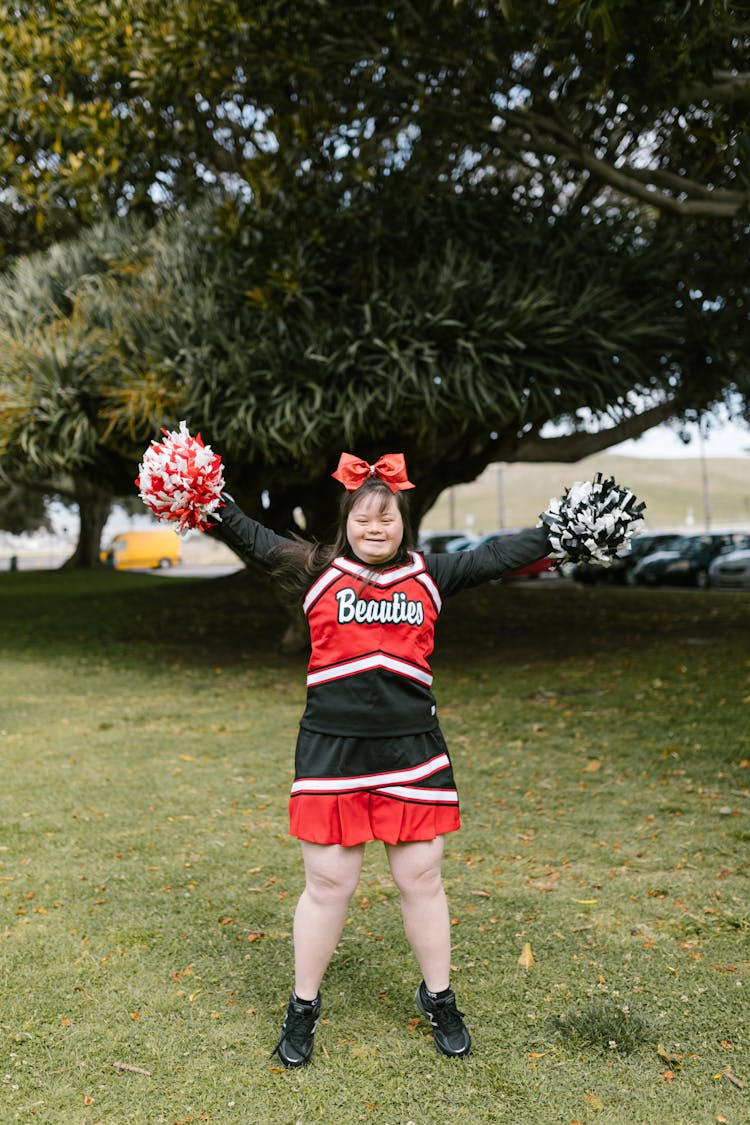 A Woman In Cheerleader Outfit