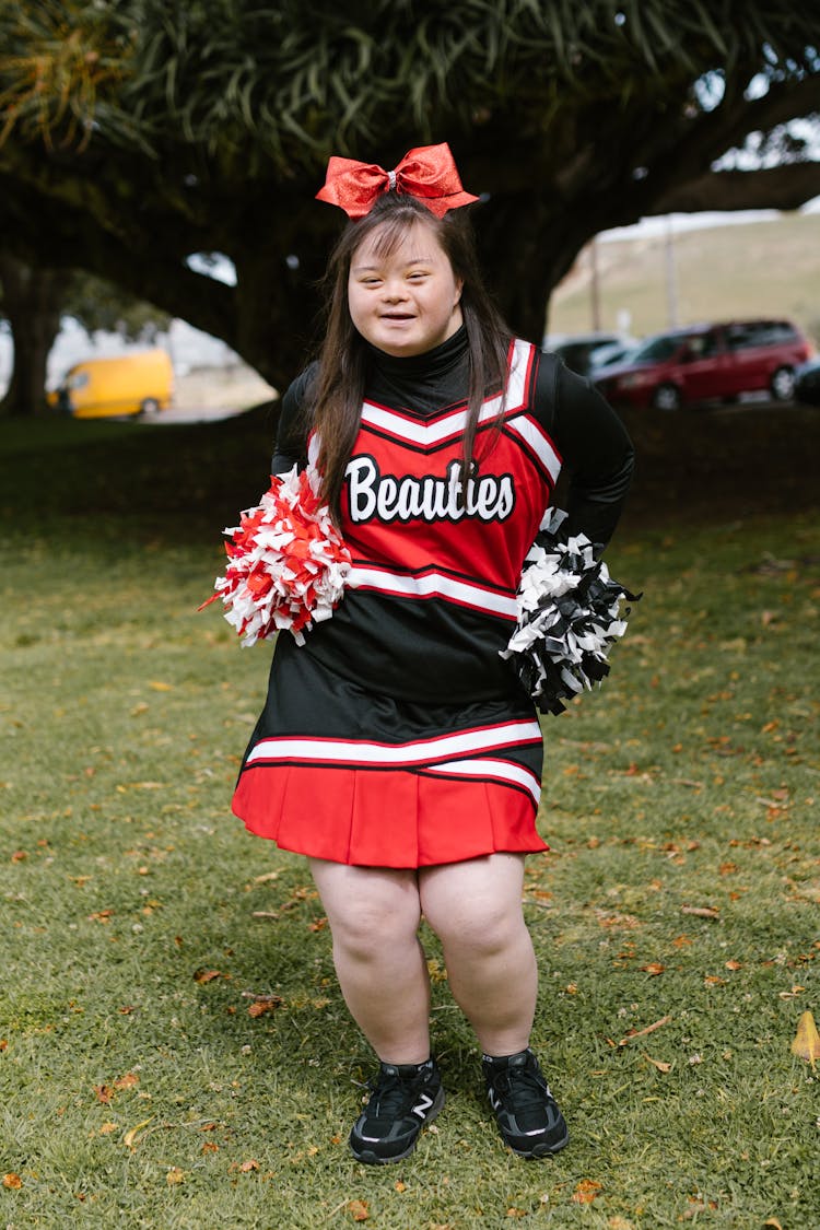 A Woman In Cheerleader Outfit