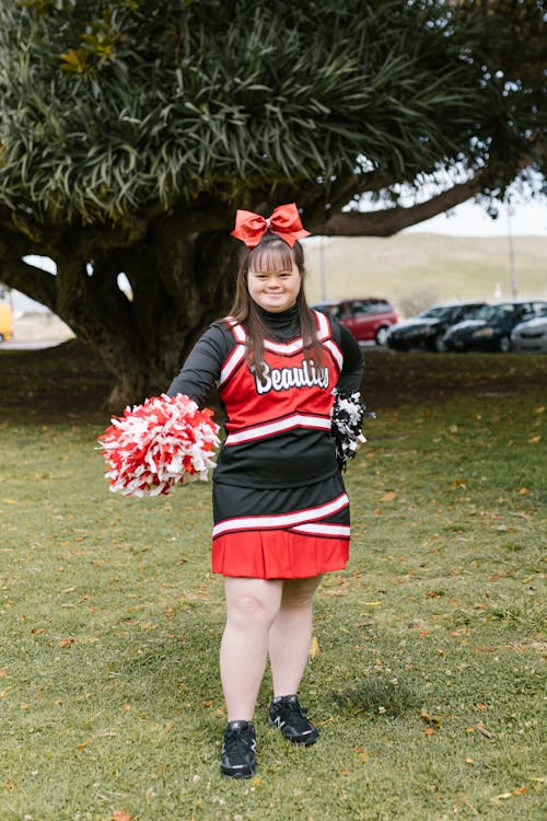 A Woman in Cheerleader Outfit Dancing