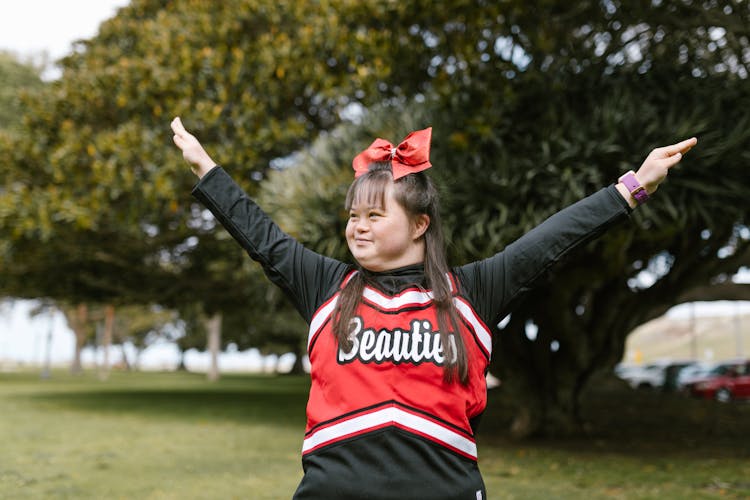 A Woman In Cheerleader Outfit