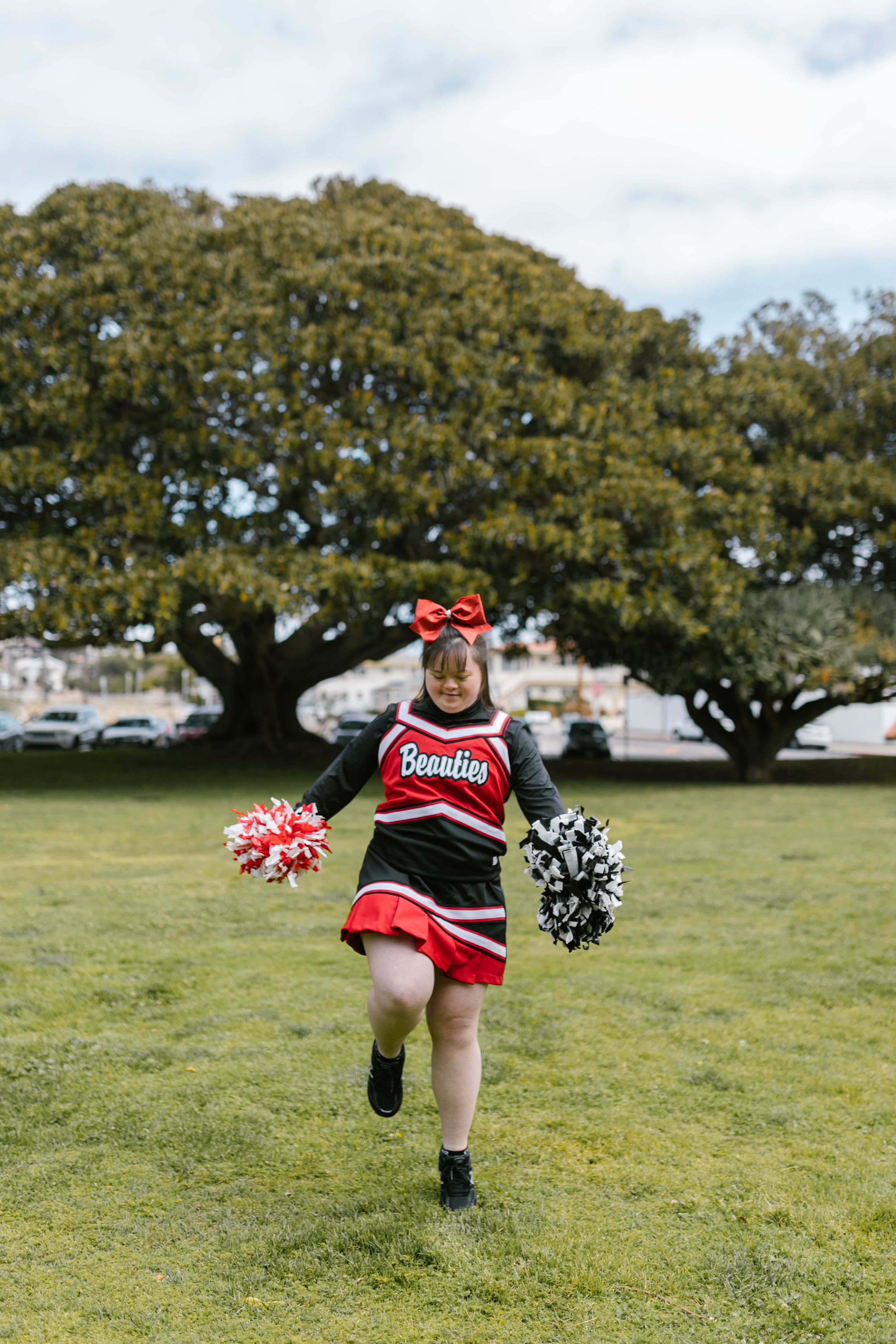 A Woman in Cheerleader Outfit Dancing · Free Stock Photo