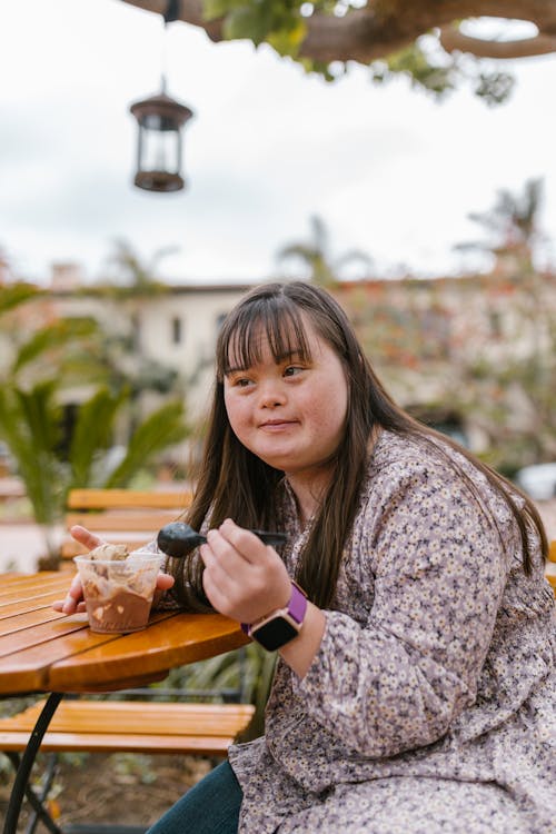 Woman Eating Ice Cream