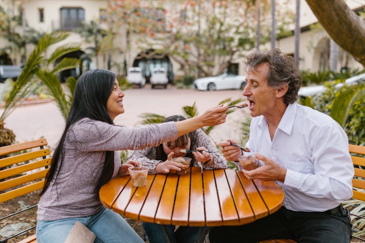 Happy Family Eating Ice Cream Together