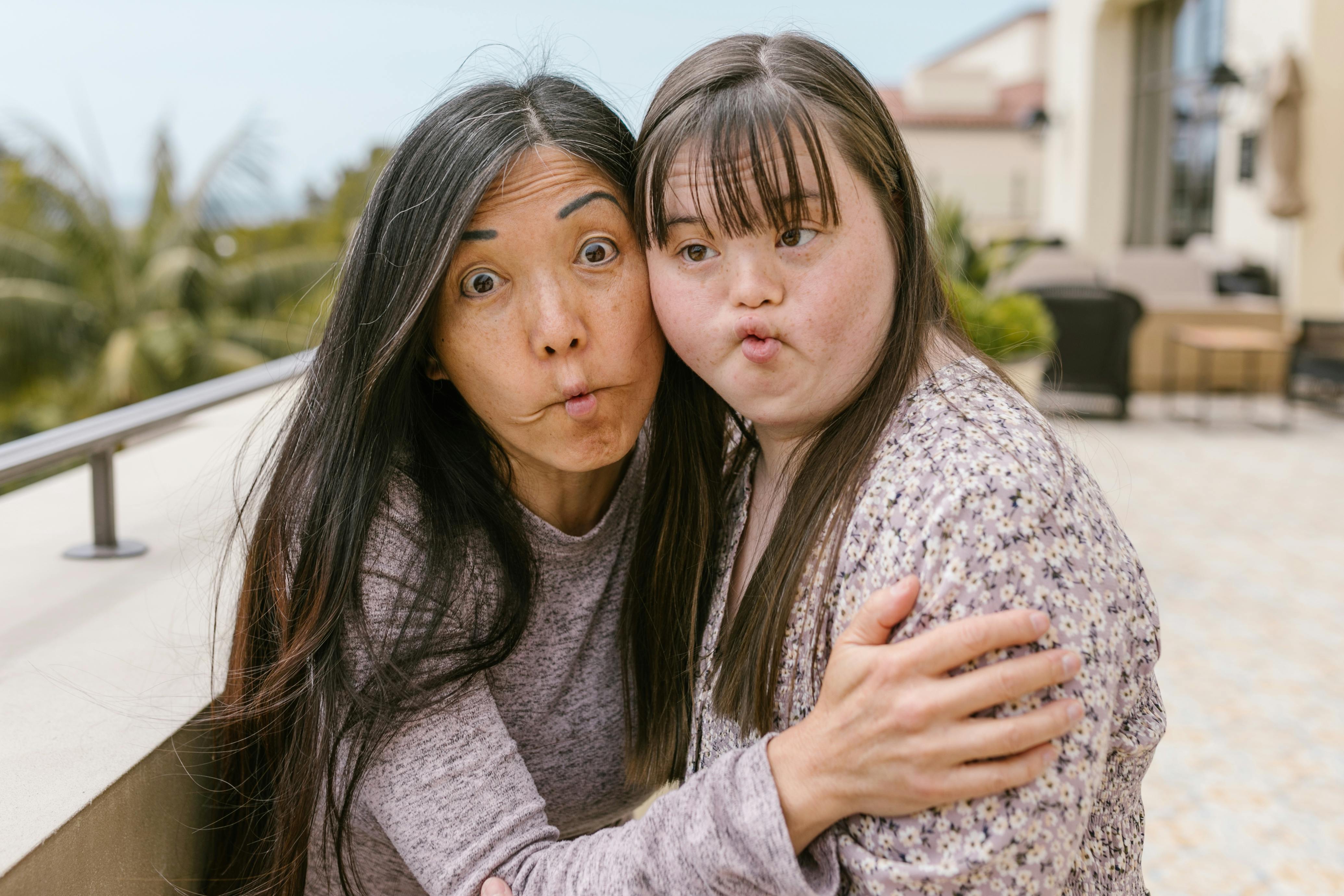 Mother and Daughter Making Silly Faces · Free Stock Photo