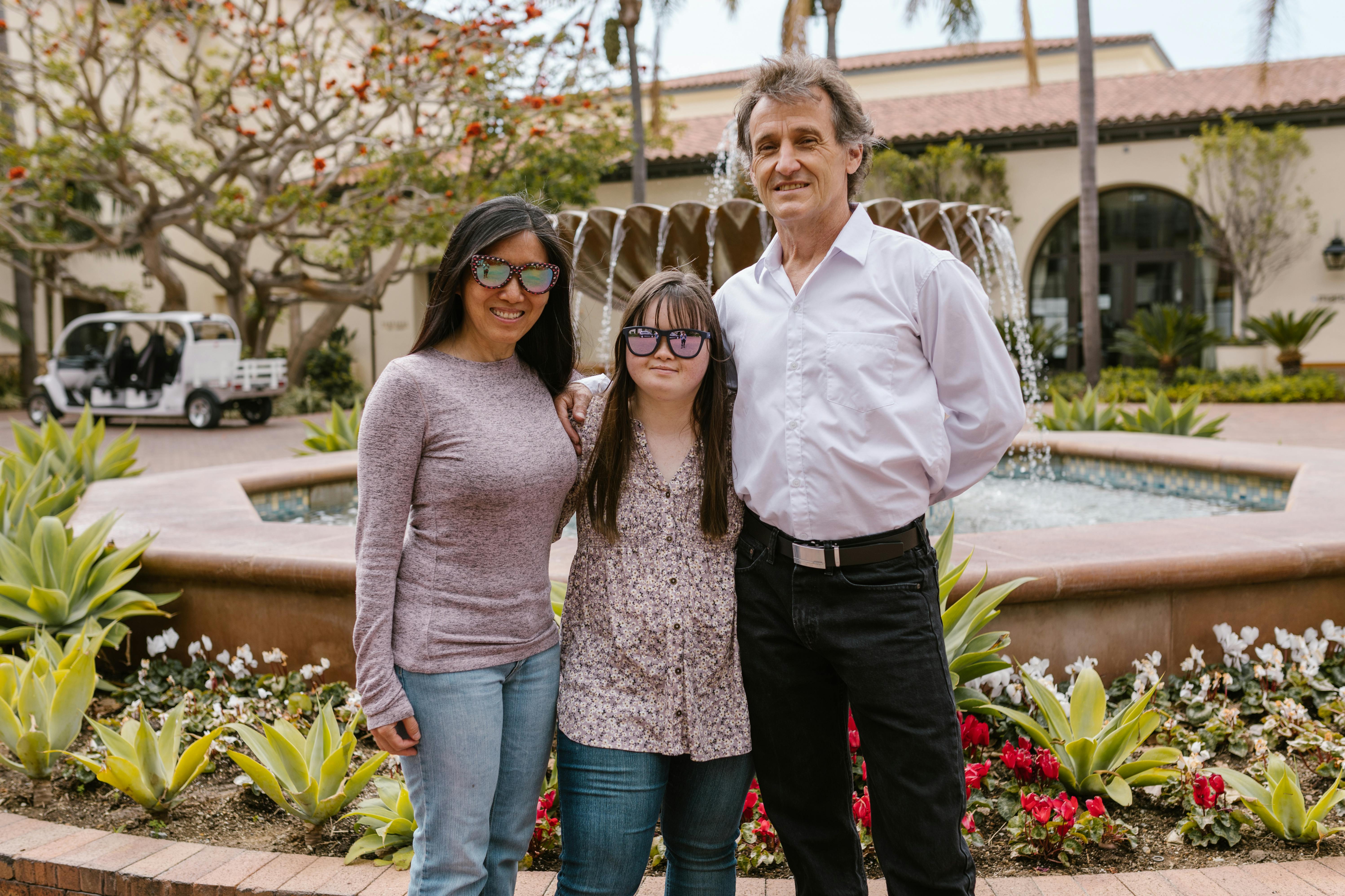 Happy Family Standing Close to Each Other