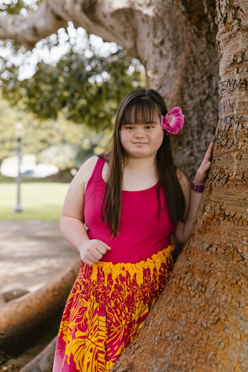 A Girl Posing Under a Tree