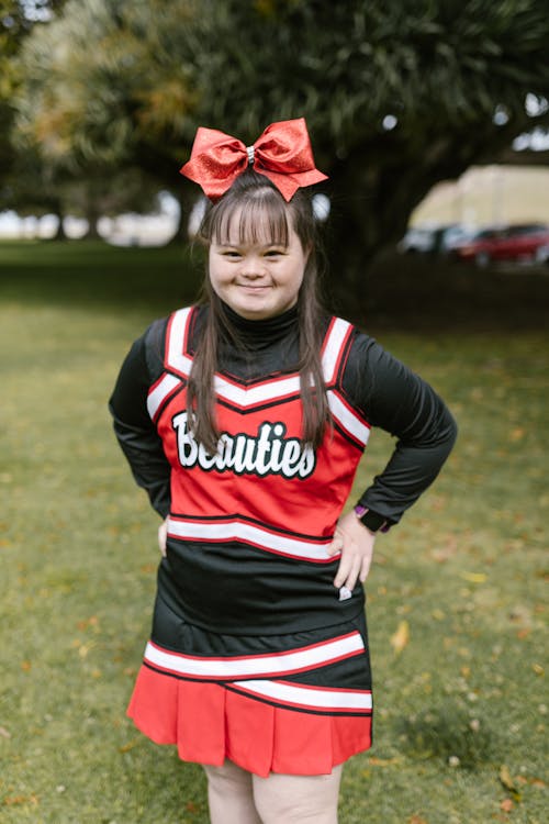 A Cheerleader with a Ribbon on the Top of Her Head