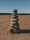 Stacked Stones in the Sand