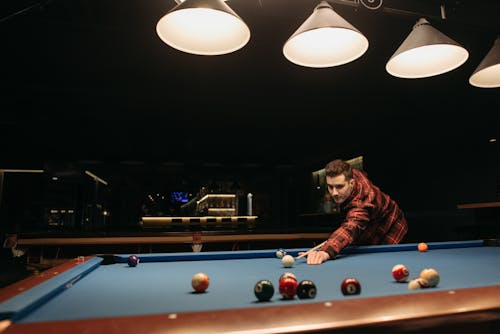 Free Man in Red and Black Plaid Shirt Playing Billiard Stock Photo
