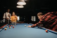 Friends Playing Billiards