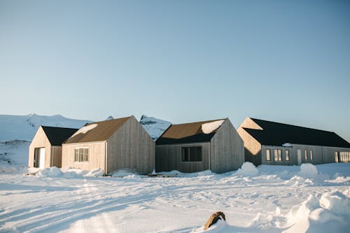 Photos gratuites de bâtiments, couvert de neige, enneigé